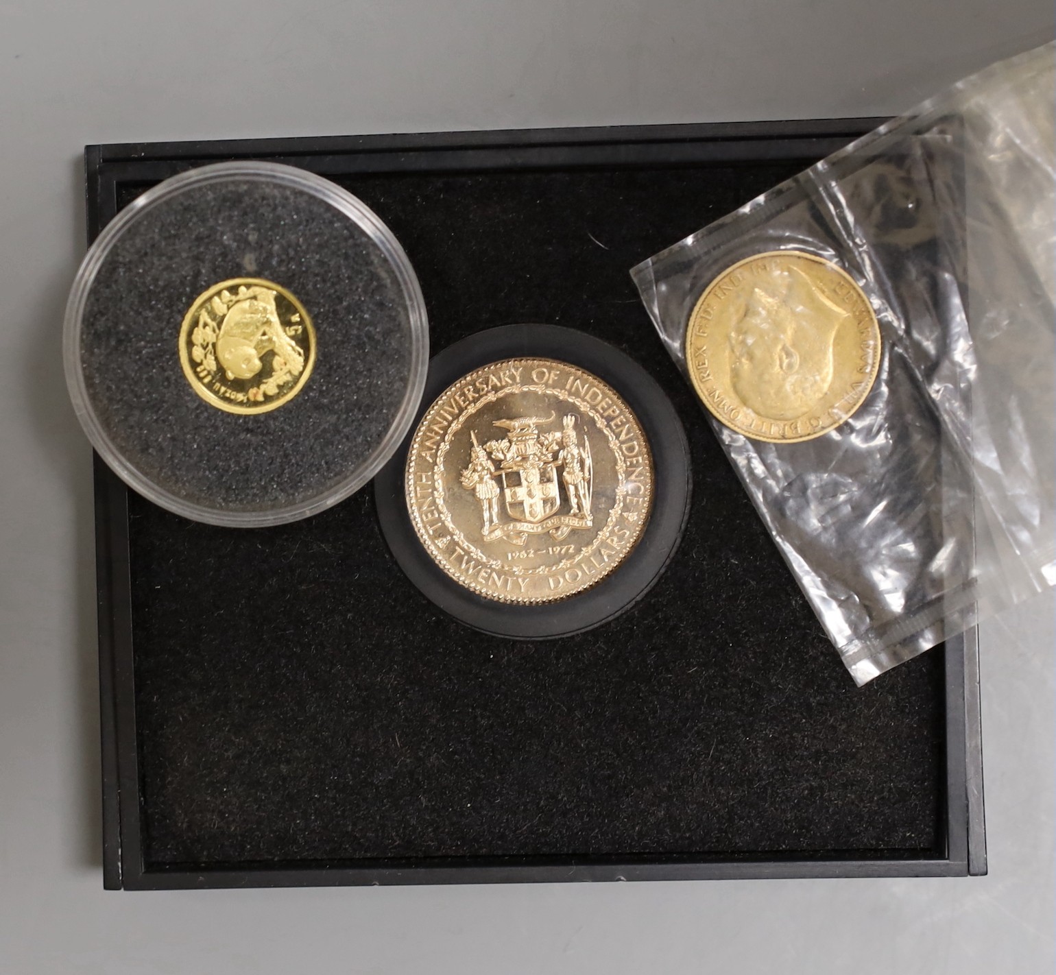 A Jamaica 1972 10th anniversary of independence proof gold $20, an Edward VII gold half sovereign 1903 and a China gold 5 yuan 1997